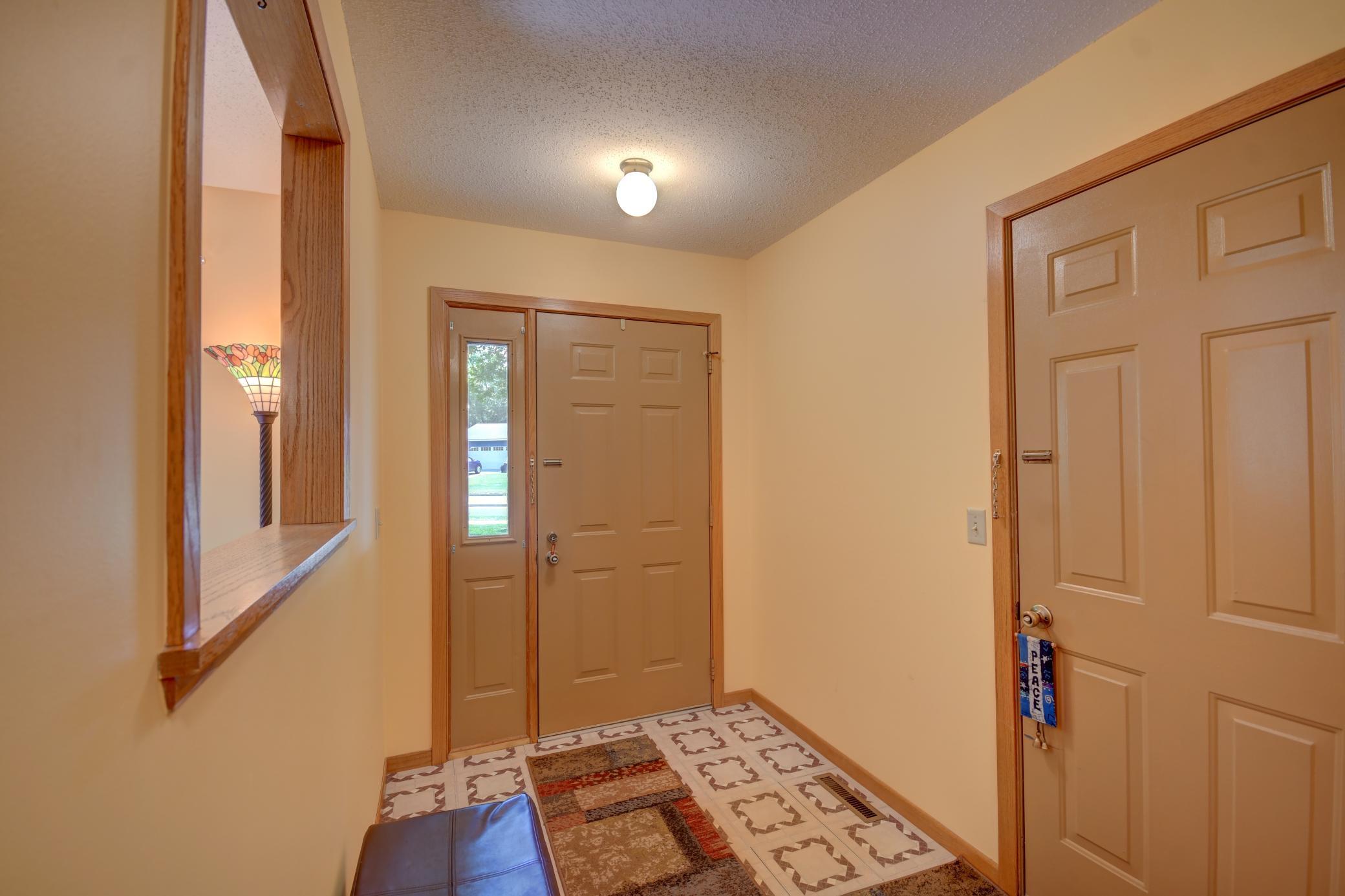 Front Entry | Door to Garage