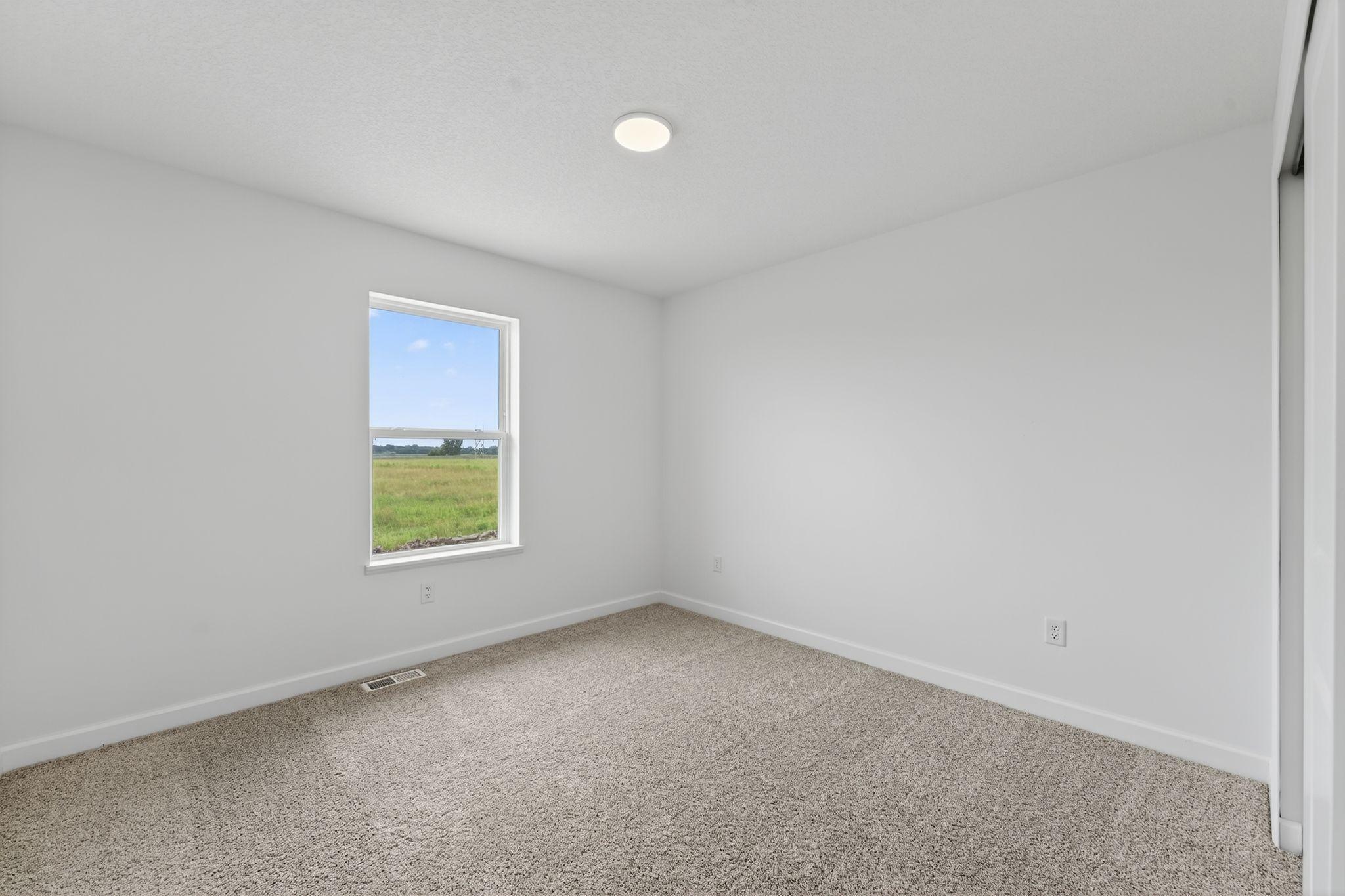 (Photo of a similar home, actual finishes may vary)