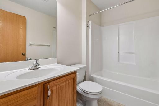 main level full bathroom next to spare bedroom