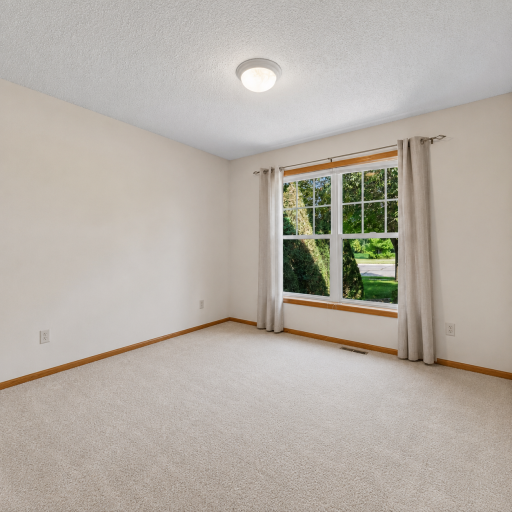 main level second bedroom ~ virtually enhanced removing funiture