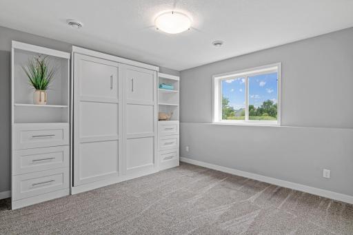 4th bedroom in lower level with a Murphy bed