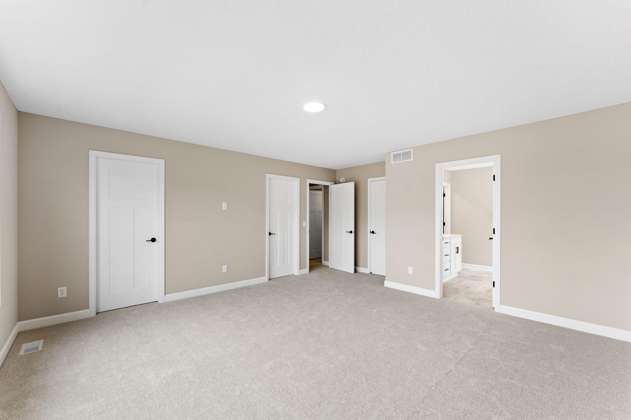 With two walk-in closets, homeowners can store summer and winter wardrobes with ease