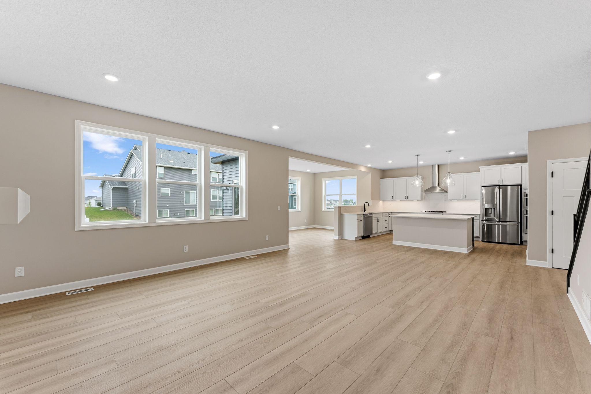 The breakfast room provides a convenient spot for casual meals and friendly conversations between the kitchen and family room.