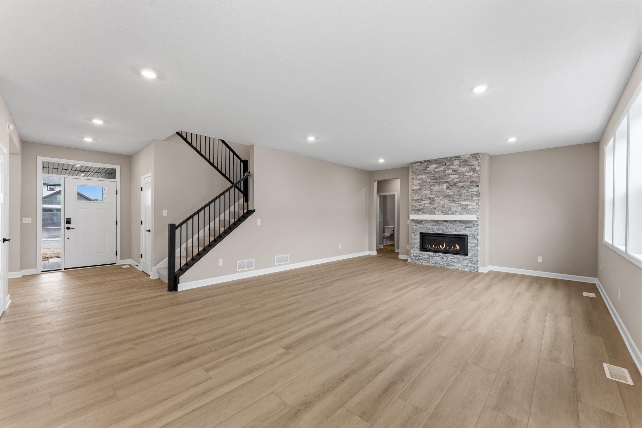The center fireplace adds a warm glow