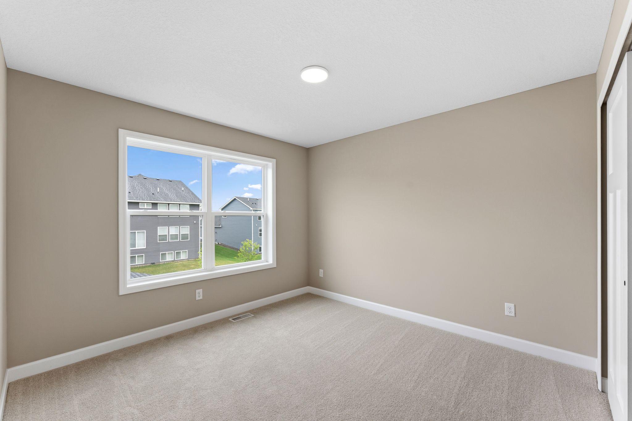 The secondary bedrooms provide comfort and privacy.