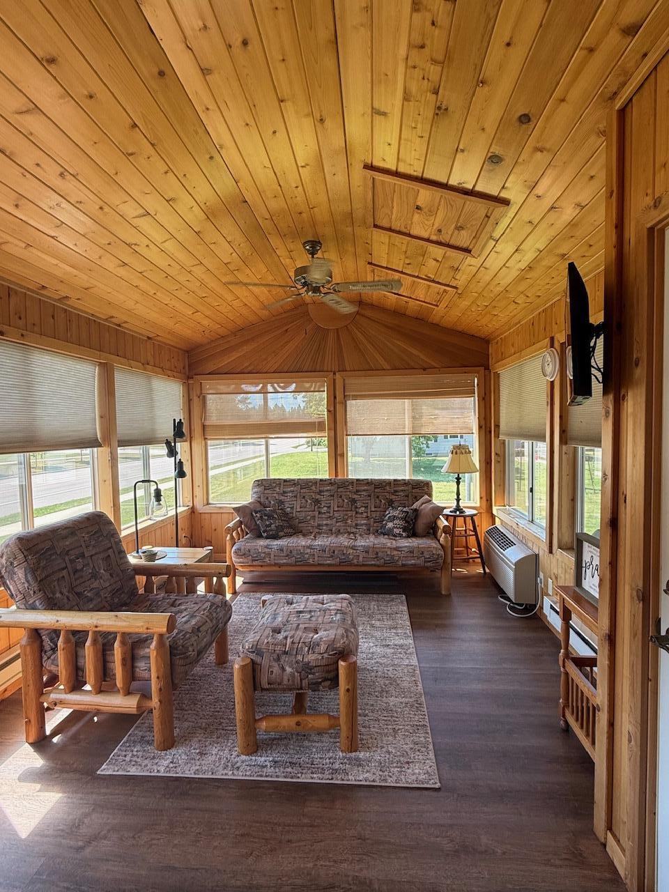 Best room of the house is the sun room with toungue & groove