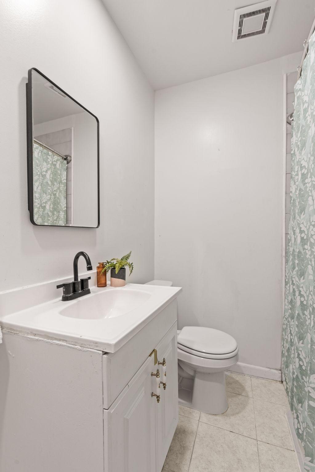 Neutral bathroom finishes offer a fresh and simple look.