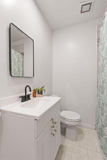 Neutral bathroom finishes offer a fresh and simple look.