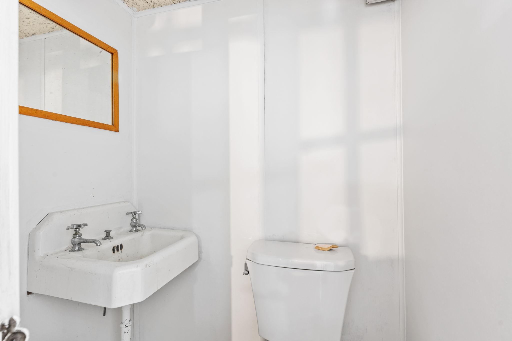 Convenient lower-level half bathroom.