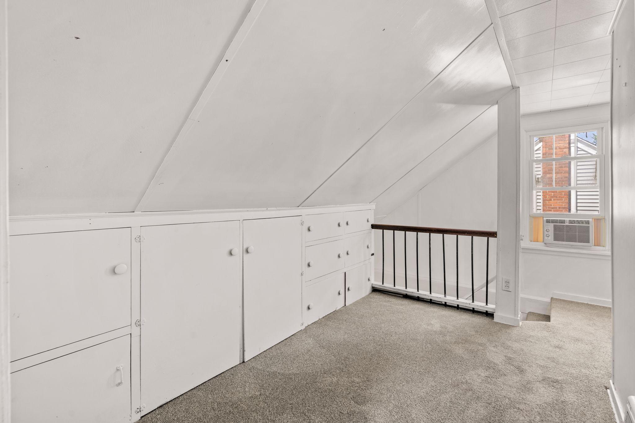 Abundant built-in storage makes excellent use of the upper level.