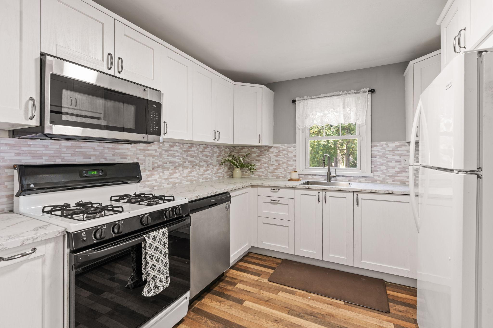 New updated kitchen with soft close cabinets and updates stainless steel appliances.