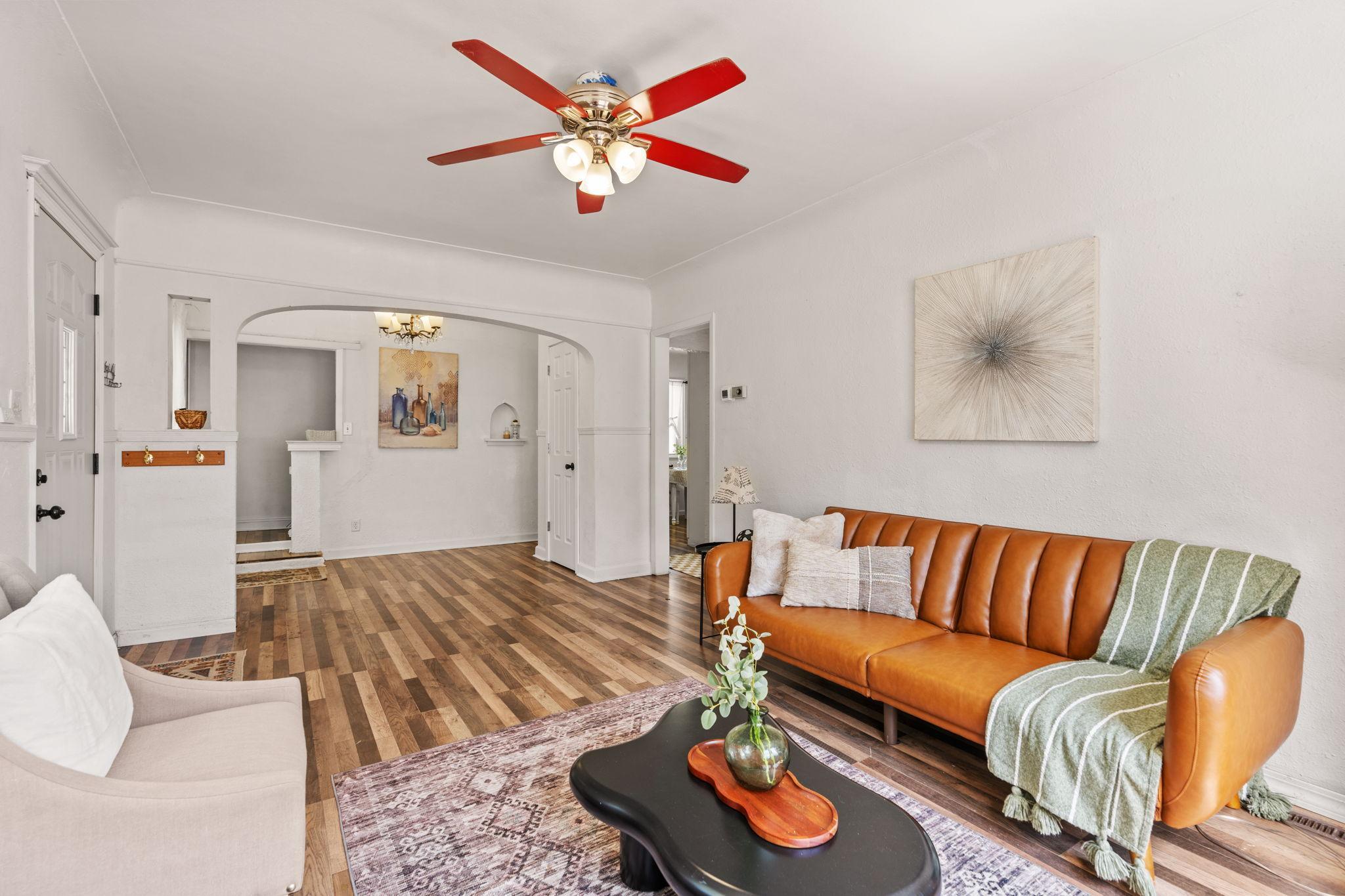 Comfortable living room with an easy flow into the adjoining dining area.