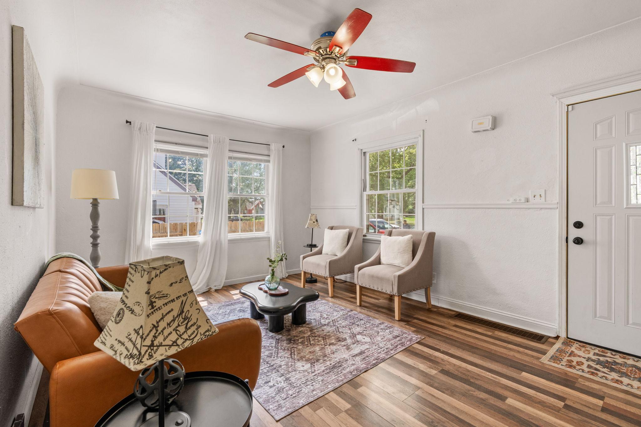 Bright and welcoming living space with plenty of natural light.