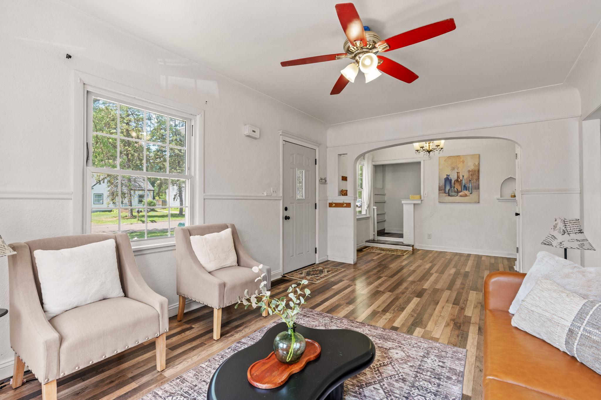 Large windows create a cheerful and inviting main-level living space.