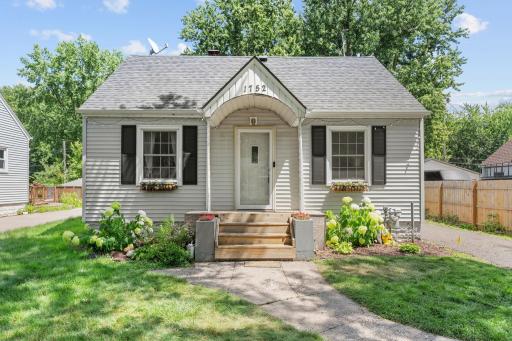Welcome to 1752 Flandrau Streetâa charming Maplewood home with a new roof, siding, and gutters.