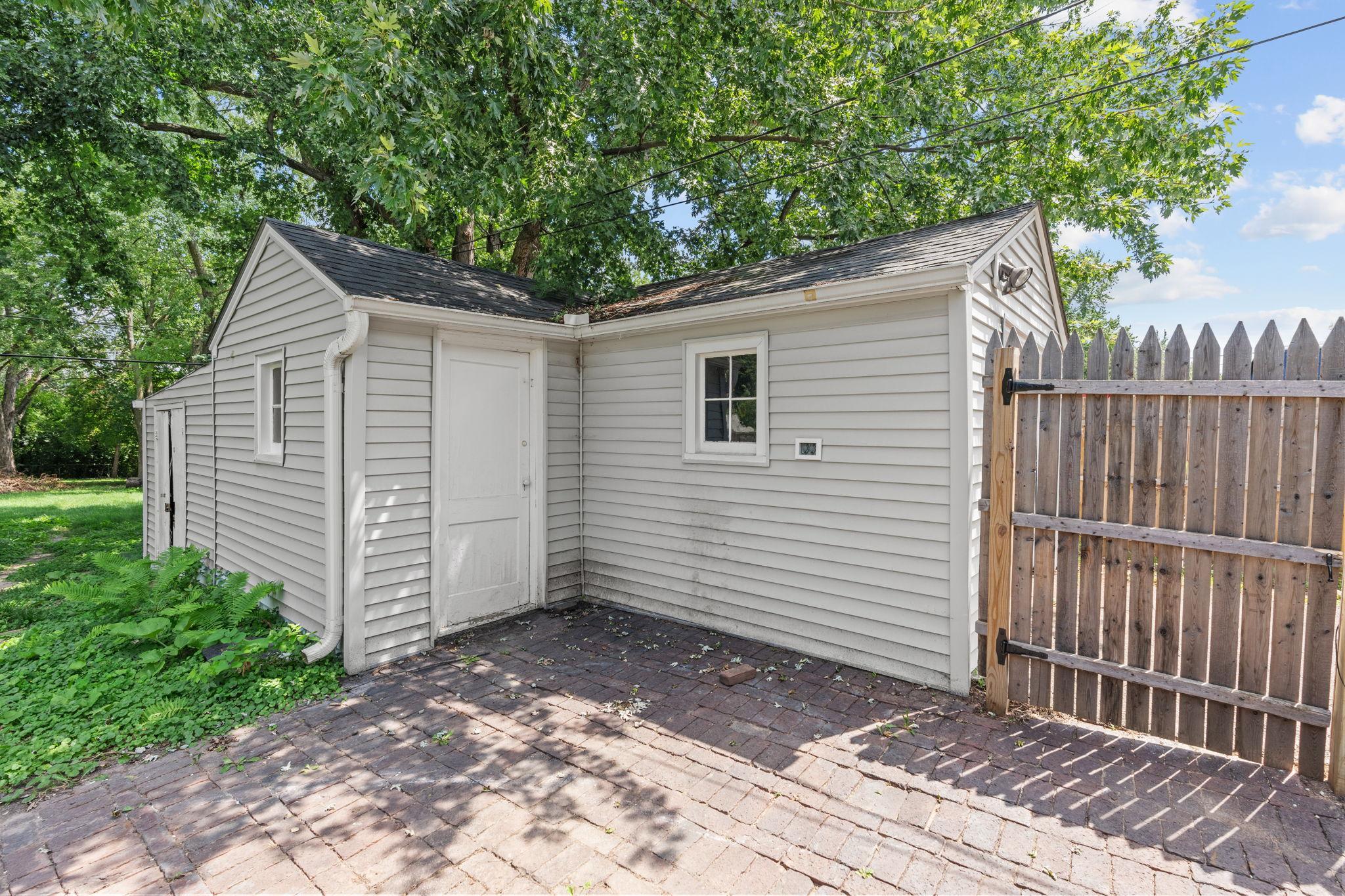 Deep, detached garage providing extra space for awn equipment, tools, and outdoor gear.