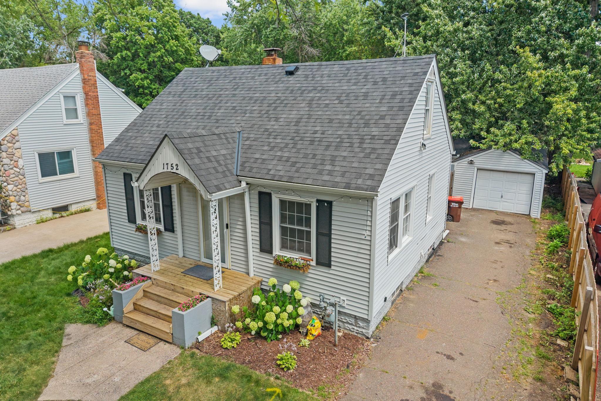 Another look at the home’s refreshed exterior and welcoming front entry.