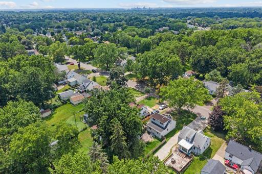 Aerial view showcasing the homeâs established Maplewood neighborhood.
