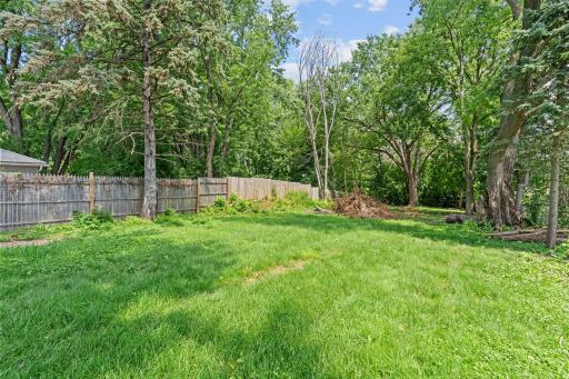 A truly impressive backyard with endless potential for gardens, outdoor gatherings, recreation, and relaxation.