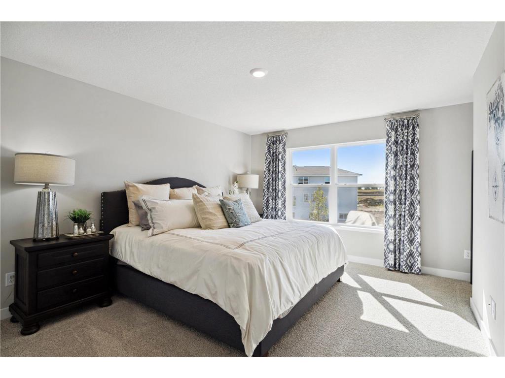 Primary bedroom features 2 walk in closets