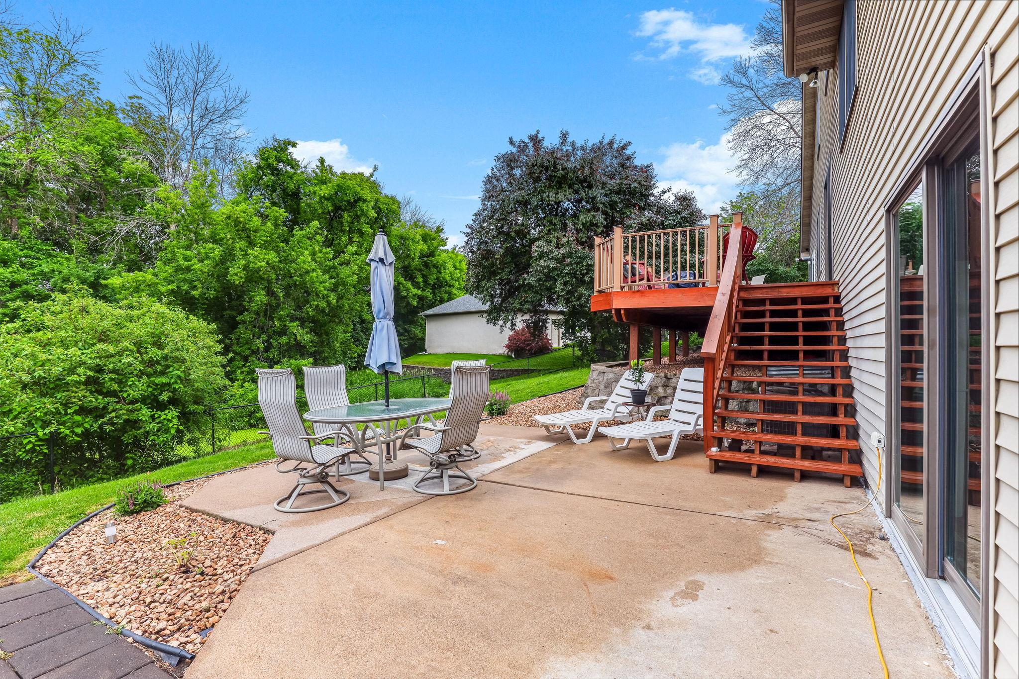 2nd entertaining area steps down from deck or off family room patio door.