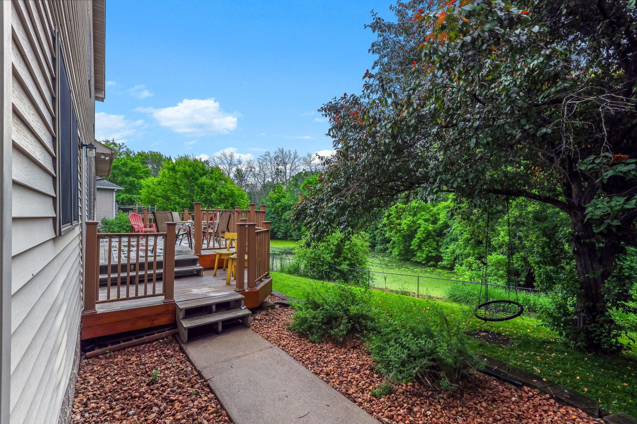 View of deck from side entrance to backyard.