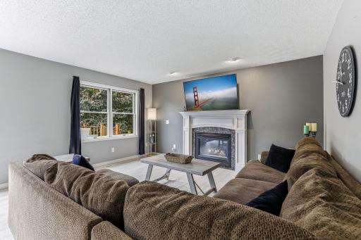 Plenty of space and light in the living room just steps from kitchen.