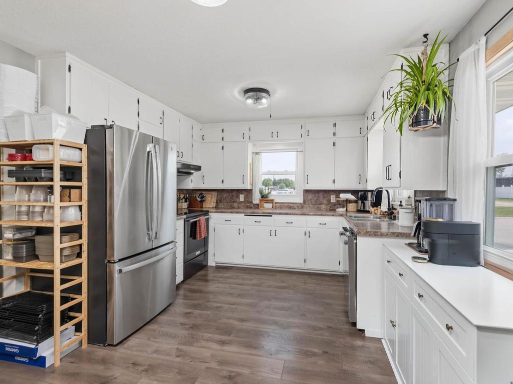 There is abundant counter space in this kitchen for cooking, baking and storage of appliances.