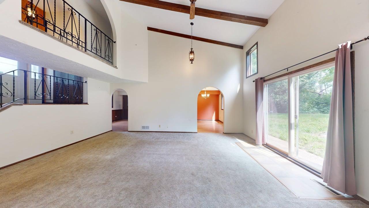 Living room with soaring vaulted ceiling