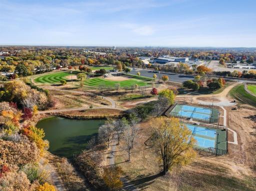 Erickson Park-Picnic shelter, concession area, 5 regulation Softball fields, 3 with field lights, and 4 tennis courts.