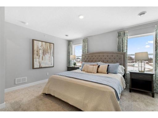 An oasis of its own, the primary suite offers the perfect escape.