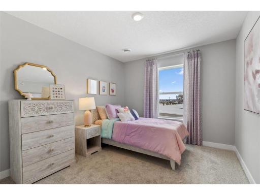 Spacious bedroom #3 with lots of natural light.