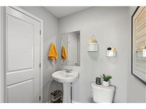 Convenient half bath situated on the main level.