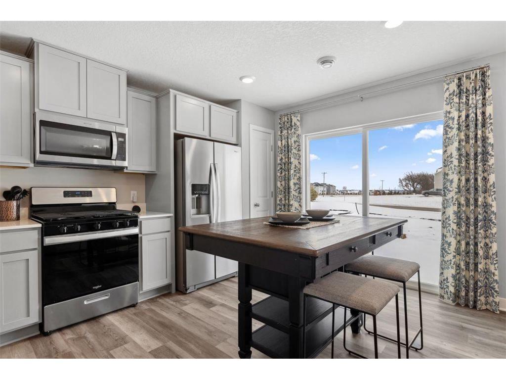 Enjoy the view of the spacious backyard while enjoying your meal.