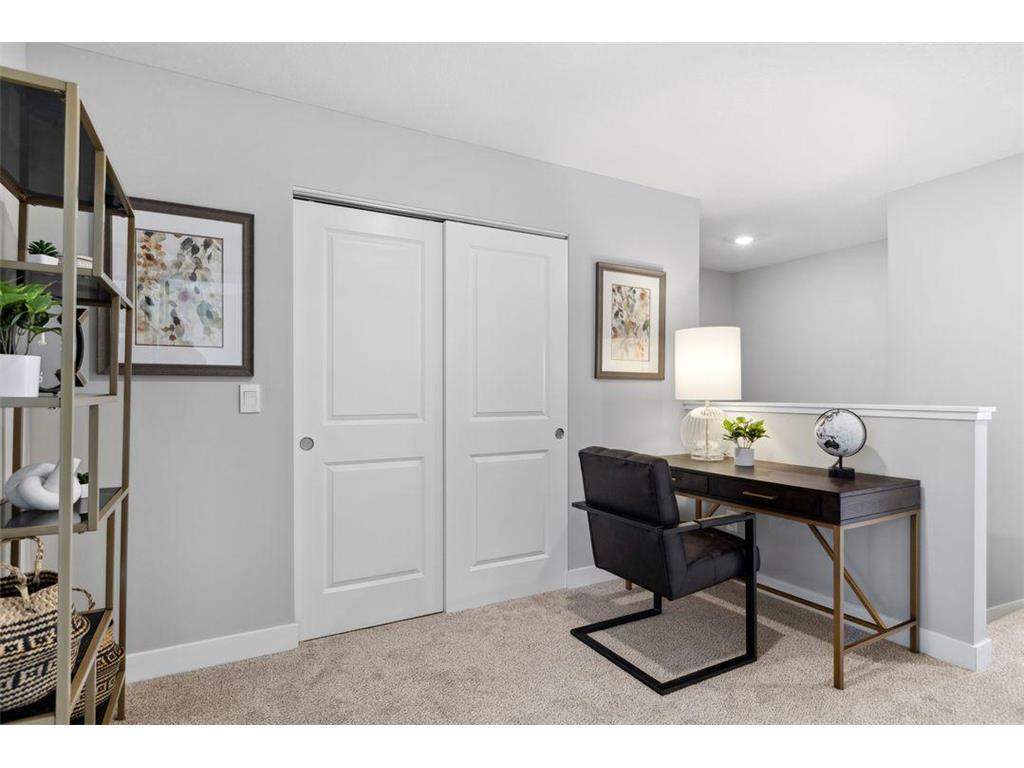 Upper level loft lends itself to so many options -- office, playroom, sitting area, you decide!