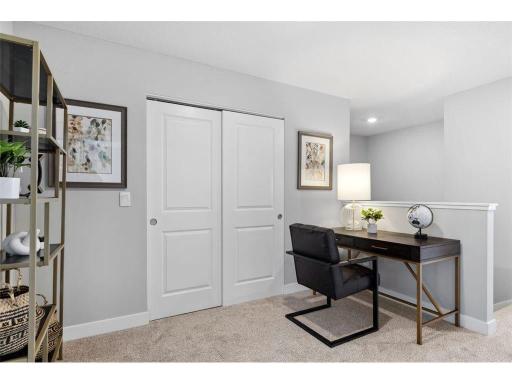 Upper level loft lends itself to so many options -- office, playroom, sitting area, you decide!