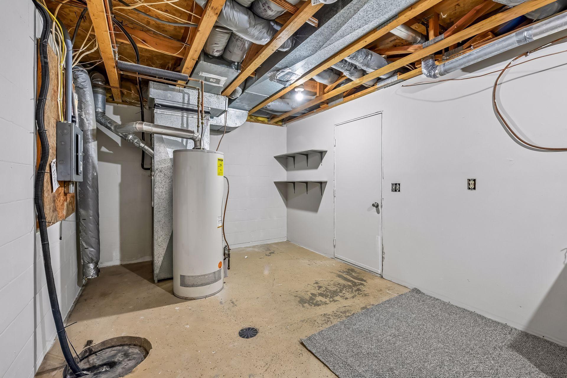Lower Level Garage Entry Door and Furnace