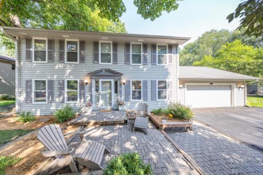 Inviting front yard patio and beautiful landscaping