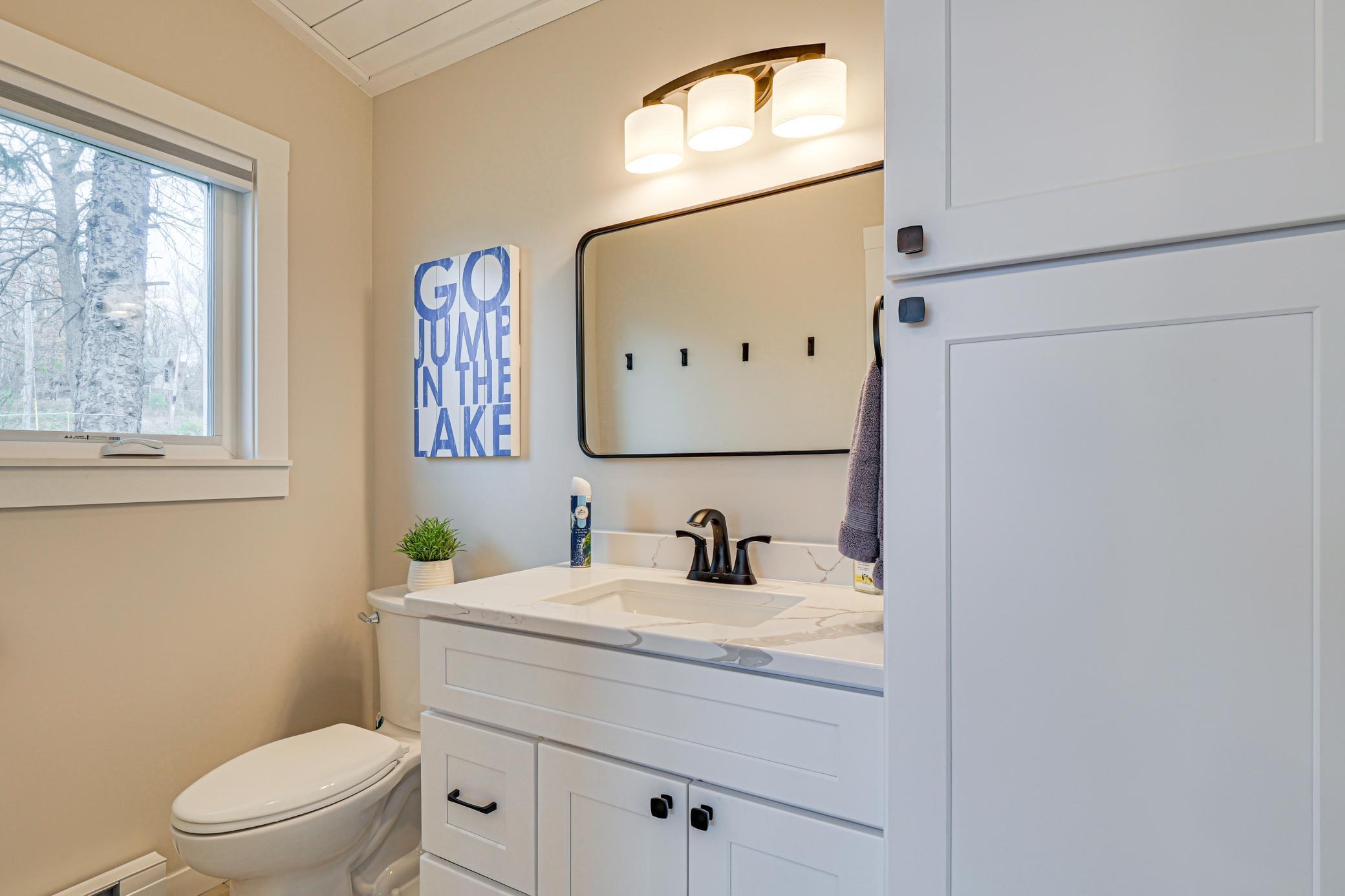 1/2 bath in main cabin with extra storage