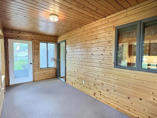 Porch is off the back of the home, with door out to back patio.