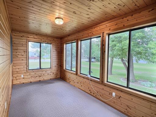 Beautiful three season porch with lots of natural light.