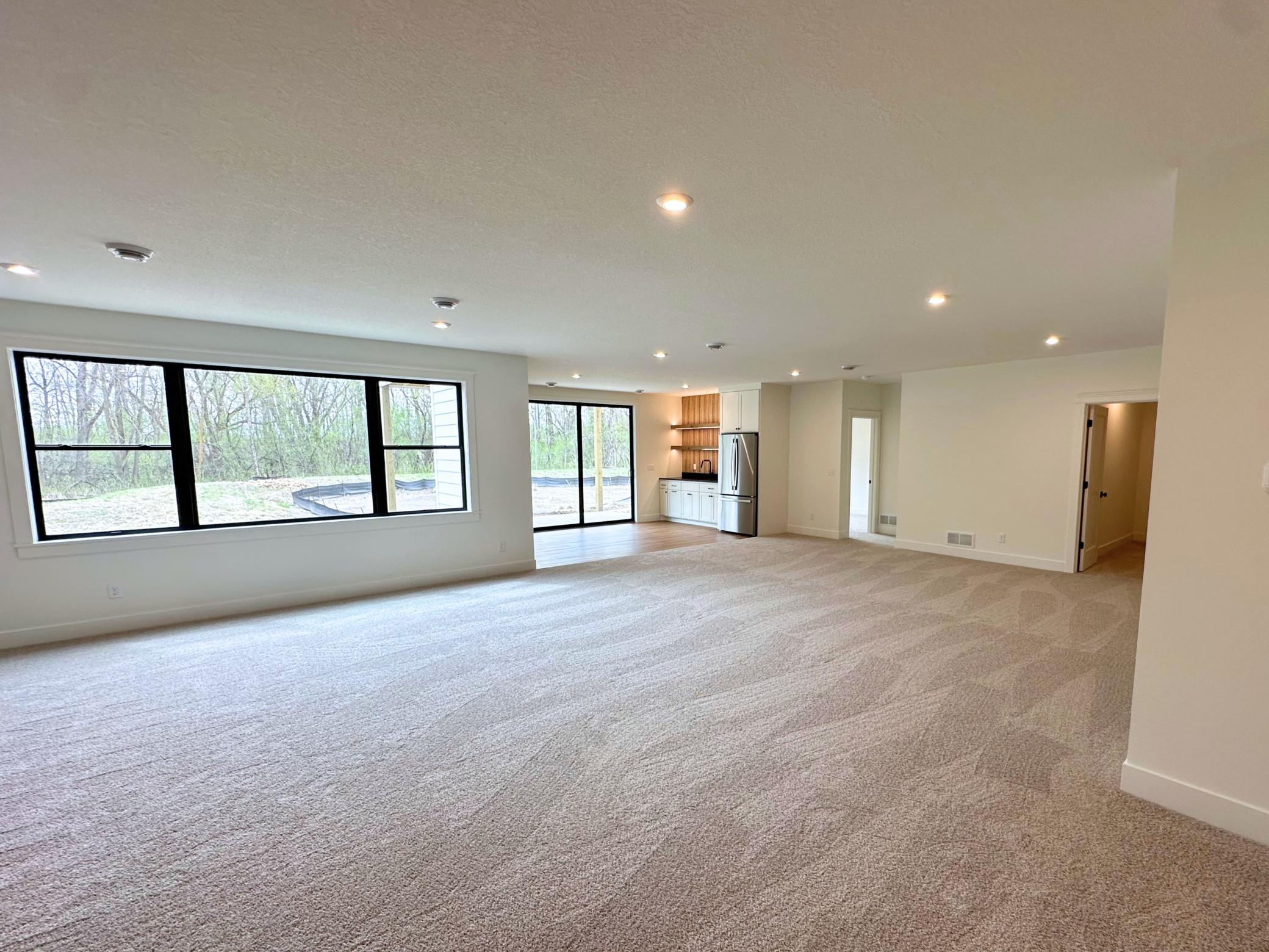 Lower Level Walk-Out Family Room and Wet Bar