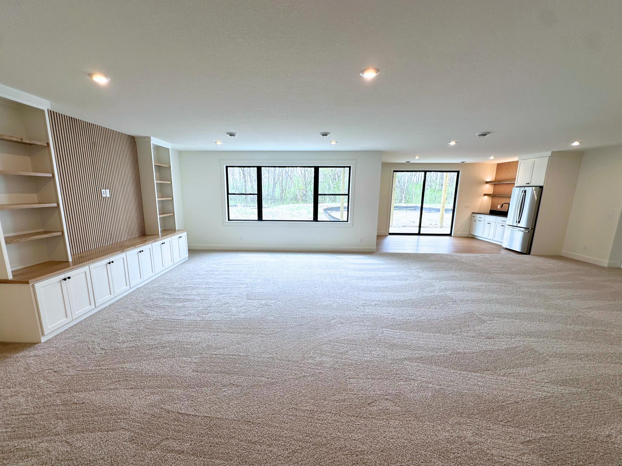 Lower Level Walk-Out Family Room and Wet Bar