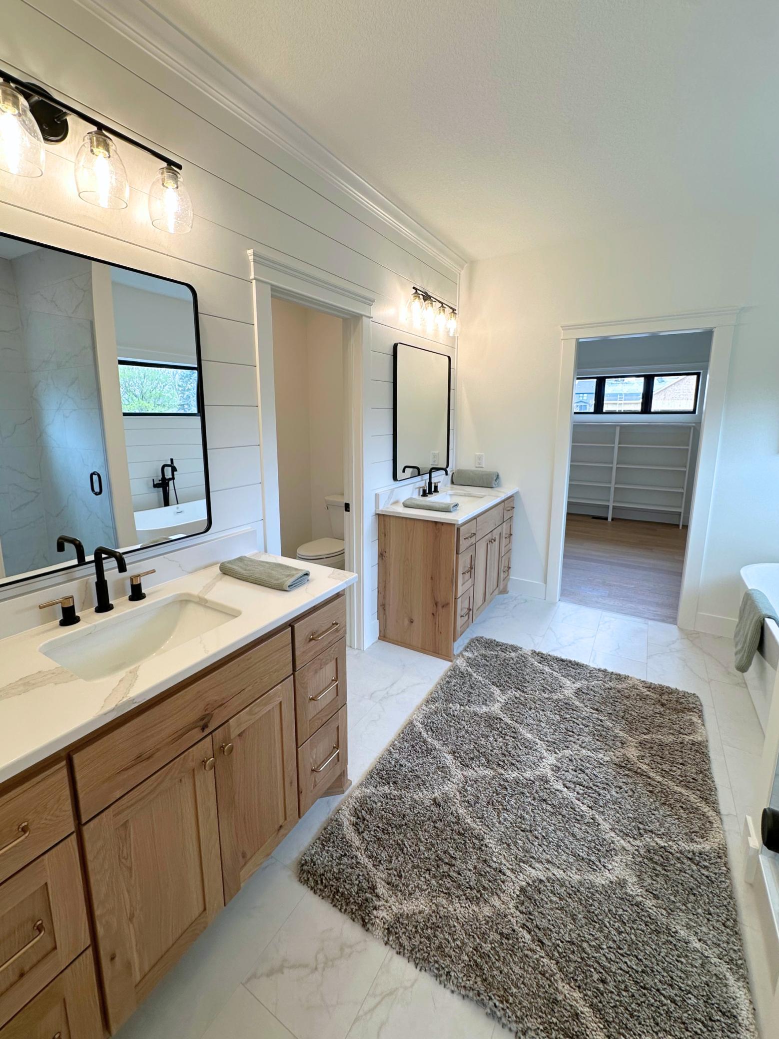 Primary Bath w/ Double Vanities, Walk-in Shower, Soaking Tub, Water Closet and Electric In-floor Heat