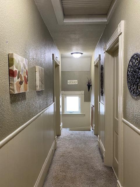 Upper level hallway to 4 bdrms and full bath