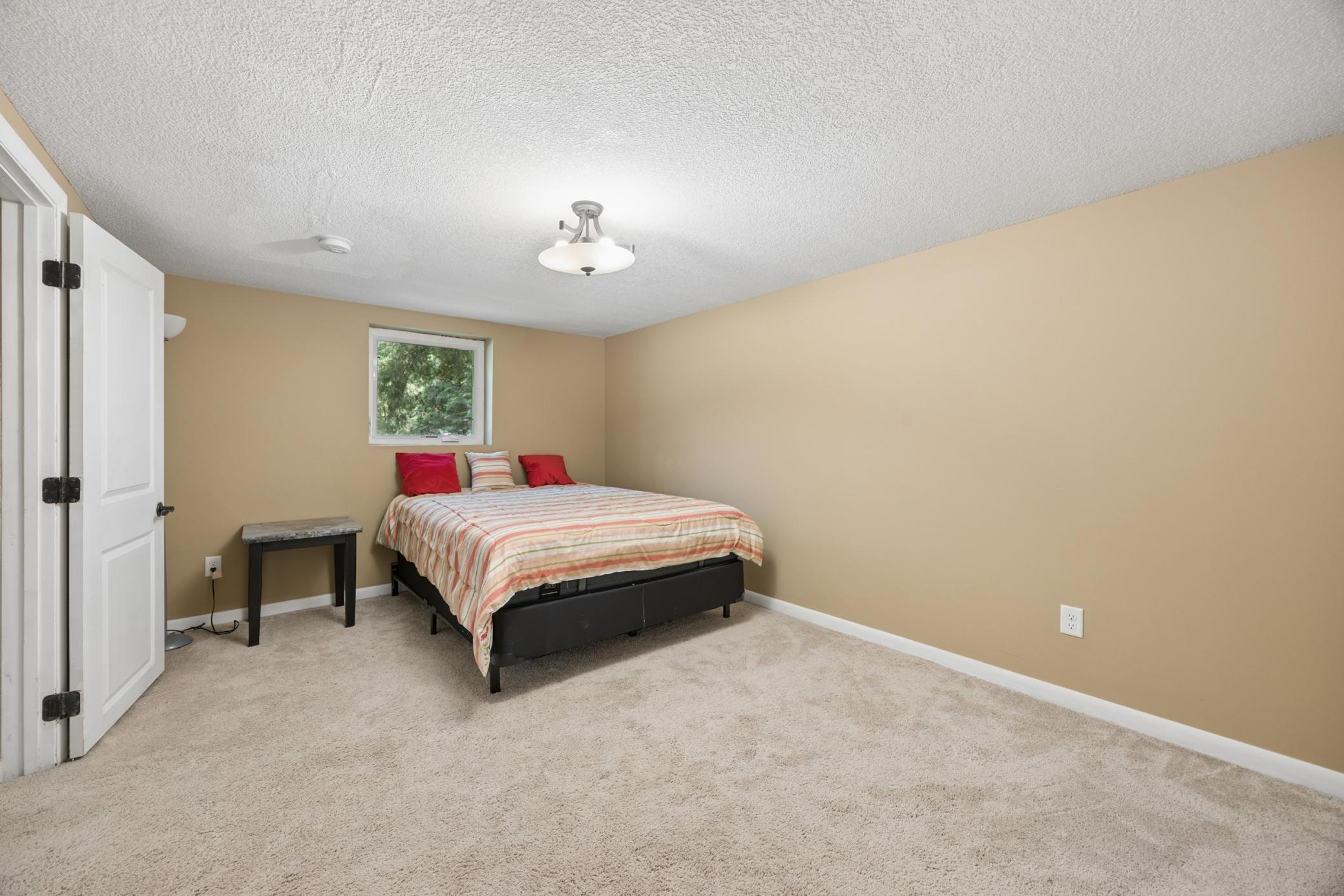 Large lower level bedroom with ensuite