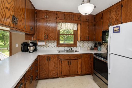Kitchen has an abundance of cabinets and counter space for entertaining and family meal time