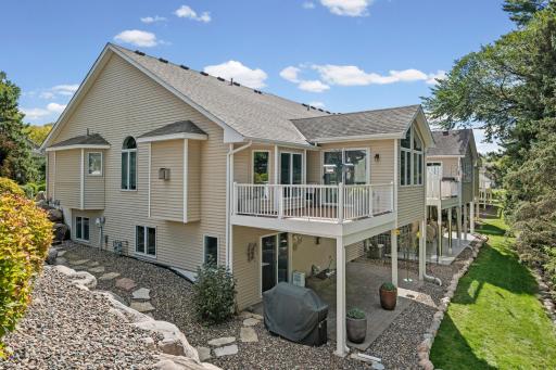 Corner unit with granite stairs and boulder wall