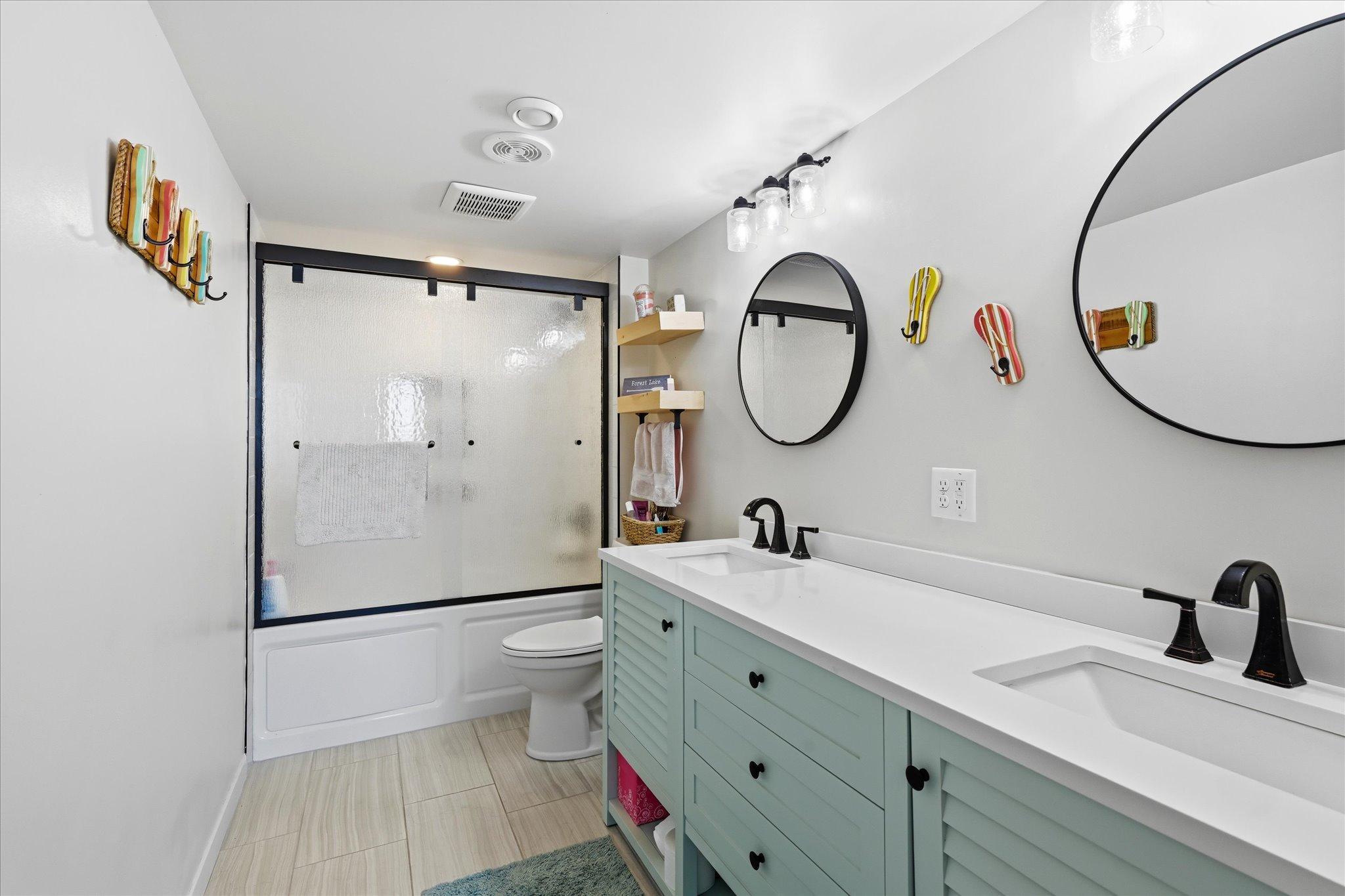 Lower level full bathroom to support the two bedrooms in basement
