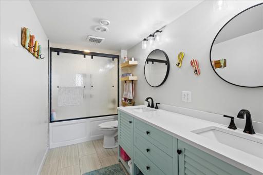 Lower level full bathroom to support the two bedrooms in basement